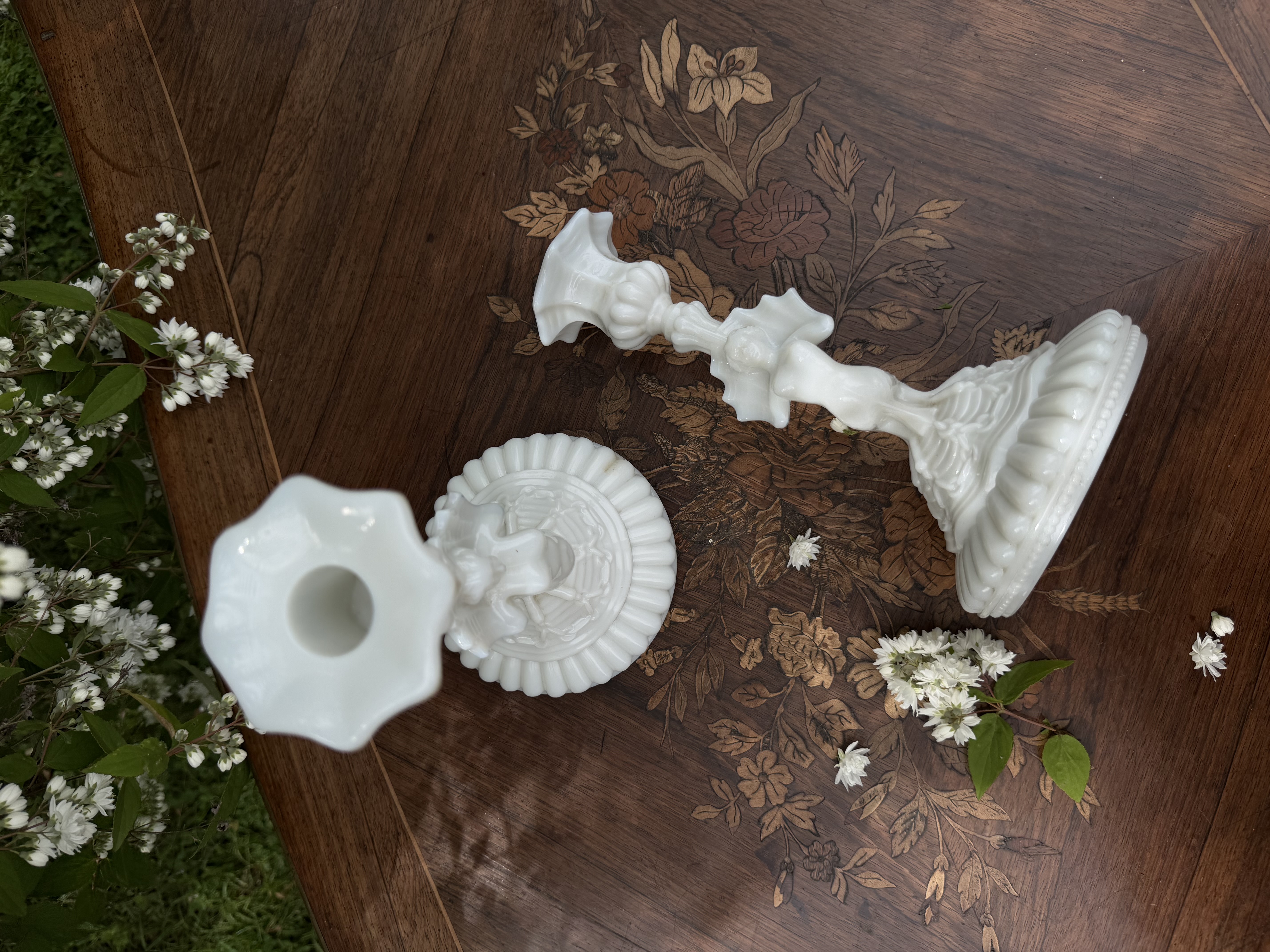 Overhead view of the scalloped sconce details