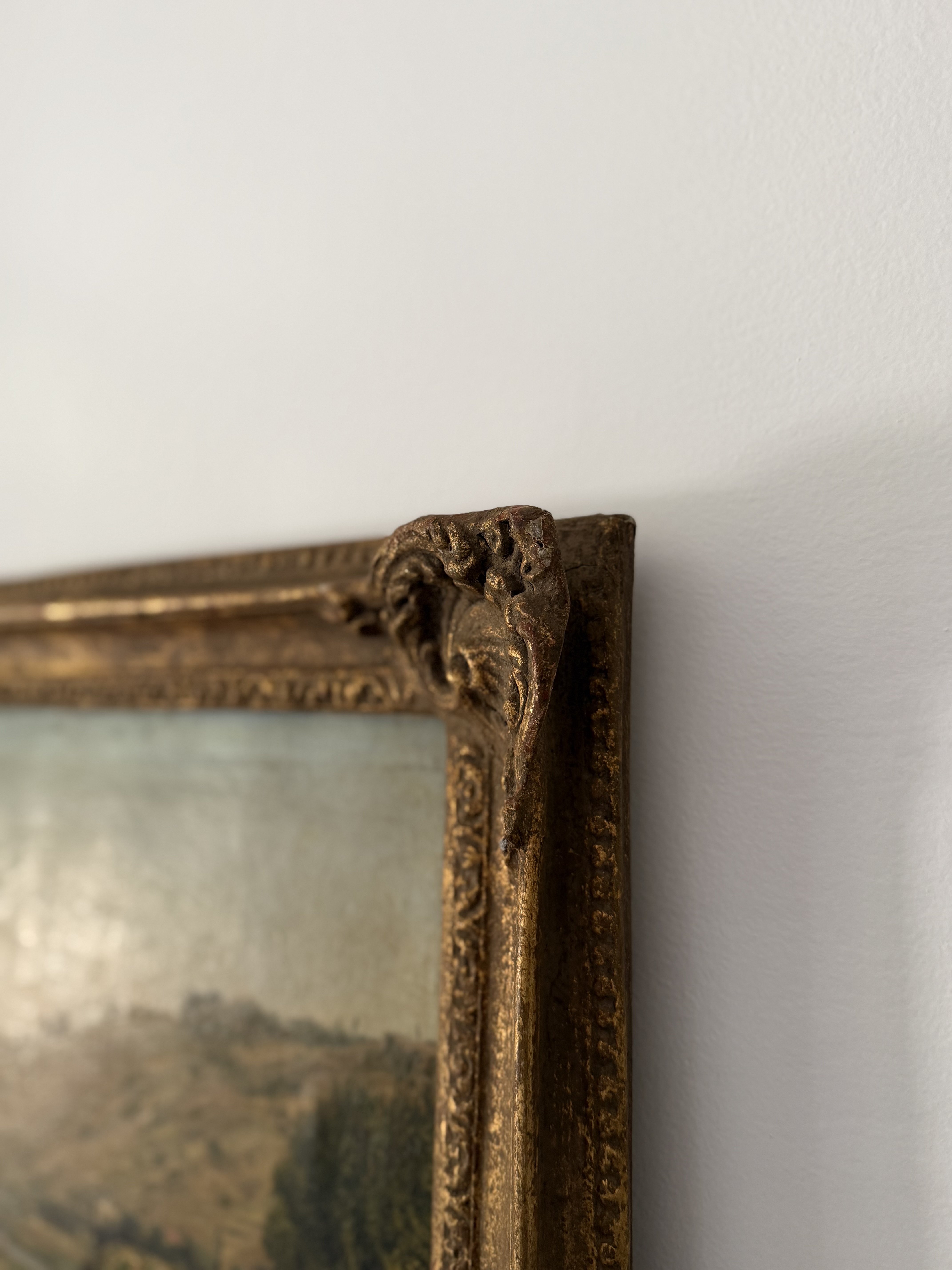 Detail of the ornate antique carton-pierre picture frame