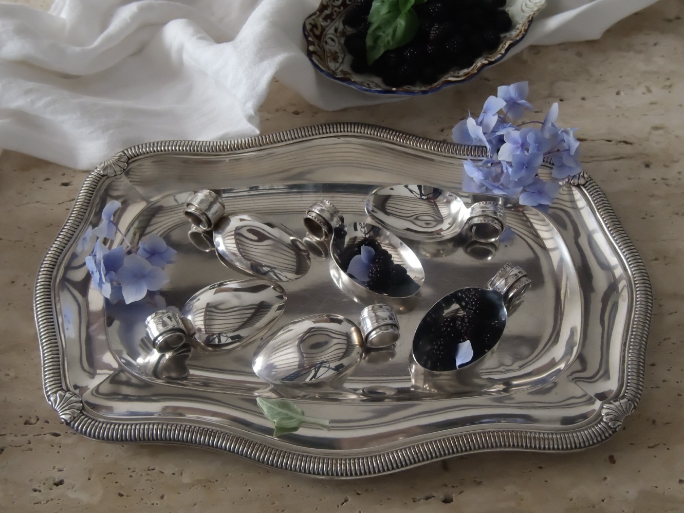 Macro view of the 12-gram silver plate hallmark stamped inside the spoon basin